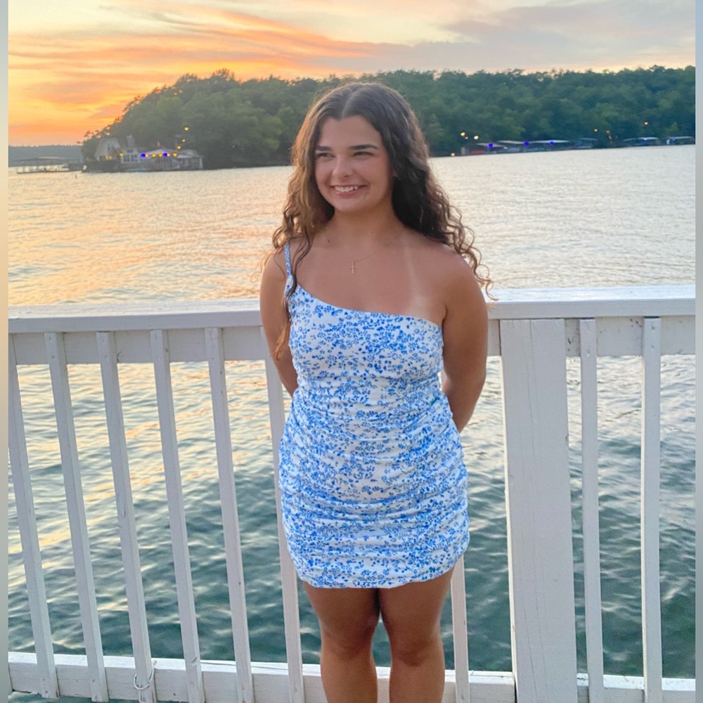 Blue and white floral dress. Size medium but fits small.